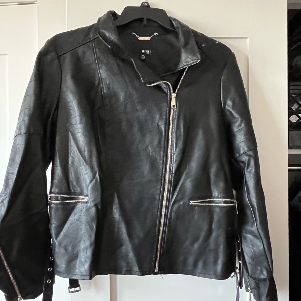 Black faux leather jacket. Like new. Only worn twice. Wear with jeans, or dress.